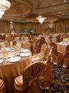 Gold Satin Chair Covers. Gold Satin Linens by www.decor-rent.com at Paradise Banquet Hall.