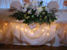 In This Wedding Head Table Decor AP CREATIONS used White and Champagne Organzas to Create the Effect of Unity of the Design and the Decor that was in Mind of the Client.
This Wedding Head Table Decor is Possible Only by Using the 
DECOR-RENT SYSTEM by AP CREATIONS.(Wedding Table Decor from AP CREATIONS is available in various color combinations.
For Wedding Table D�cor (such as head table, cake table, reception table, gift table) AP CREATIONS uses only high quality materials to obtain the best possible results. 
A Wedding Table Decor is a very important element of the wedding celebration. Wedding Table D�cor should become an ornamental addition to the event emphasizing personality and uniqueness of the wedding.
DECOR-RENT offers a special �ALL YOU CAN DECOR� program where a Bride can participate in interactive creation of the D�cor for her wedding. We let you choose your elements and coloration. And we will support you with knowledge and professionalism in selecting the right combination of wedding d�cor.
Wedding Table Decor is available for Toronto, Greater Toronto (GTA) area clients.
For other parts of Ontario please Contact AP CREATIONS or DECOR-RENT for details.